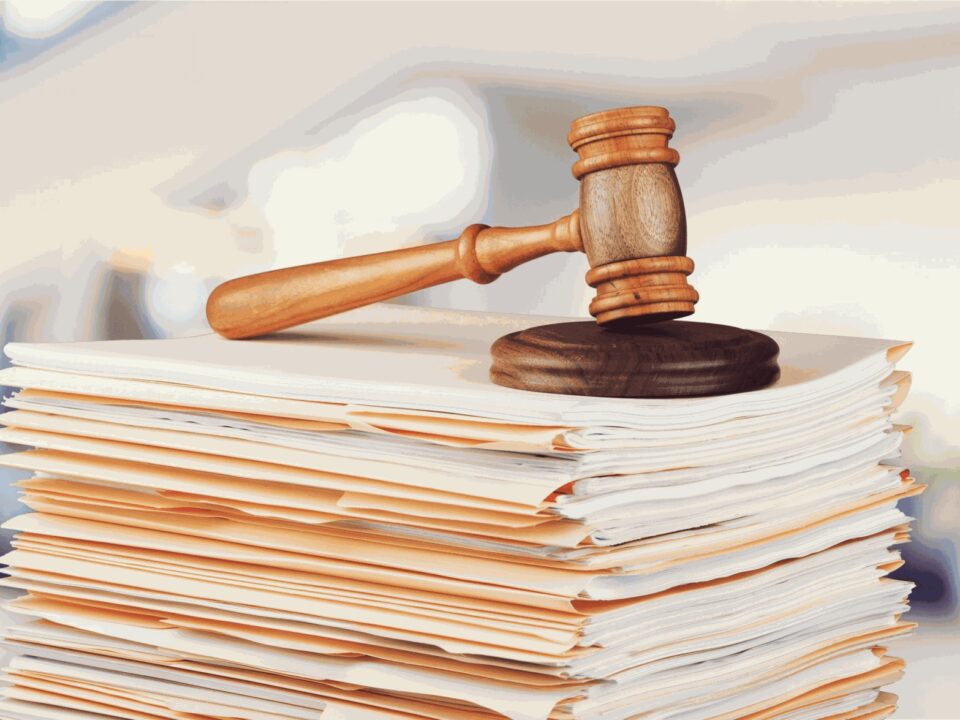 Wooden gavel on legal documents symbolizing Arizonas new criminal record sealing statute.